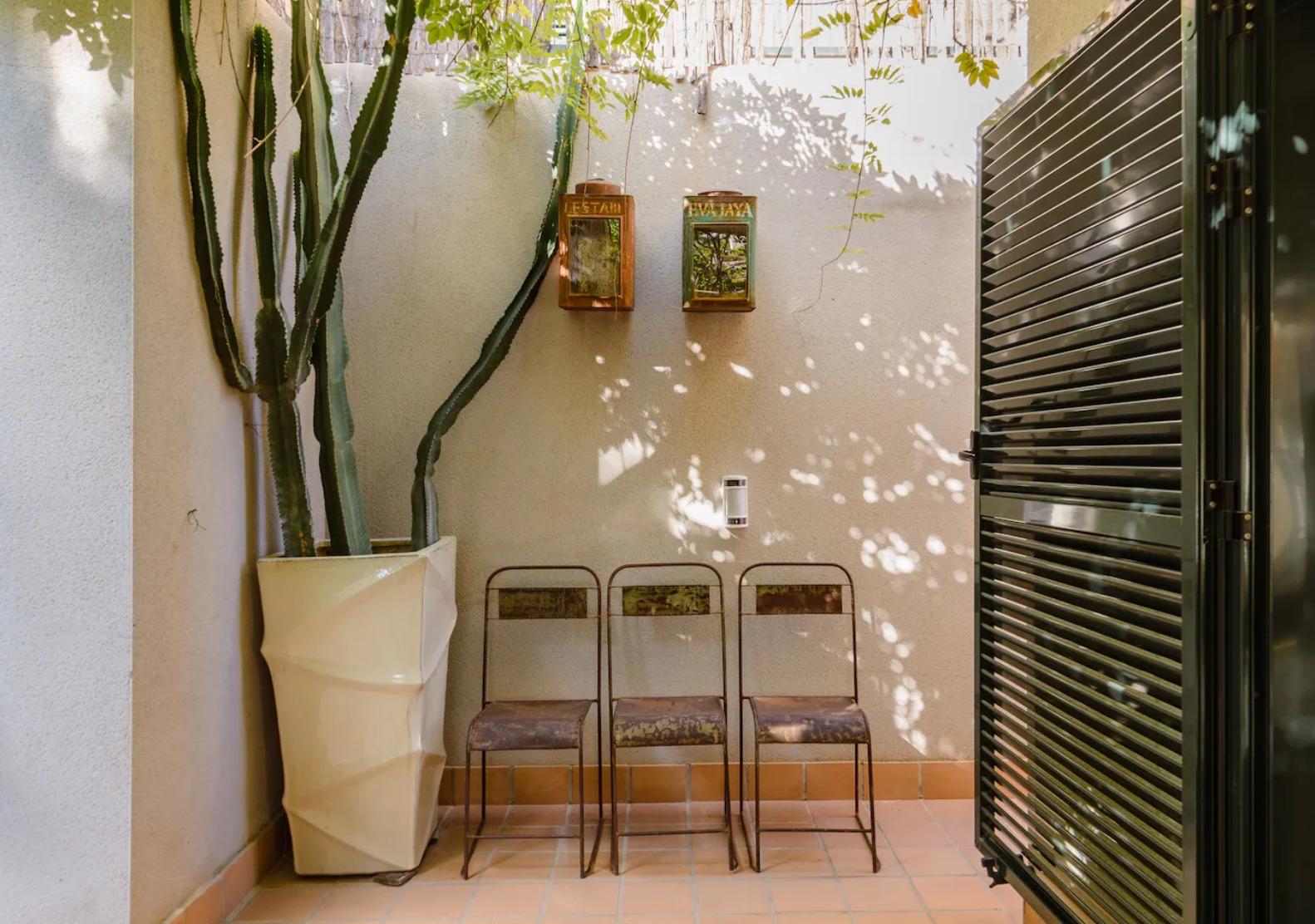 Resa Estates Ibiza te koop for sale townhouse cala tarida side garden.jpeg